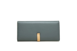 Detail of the blue-grey long wallet featuring lychee texture and yellow decorative strap