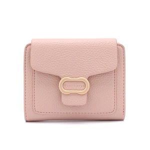 Detail of pink lychee grain PU leather texture and oval logo clasp on women wallet