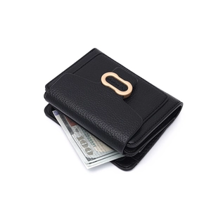 Detail view of black lychee texture PU leather wallet showing cash slot and card holders