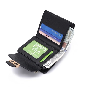 Detail view of the black leather wallet interior showing card slots and money compartment