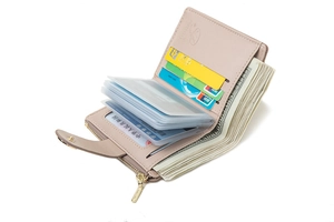 Detail of light pink foldable wallet interior showing card slots and clear ID window