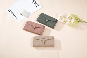 Detailed view of matte PU leather long wallets in three colors with metal buckle closure