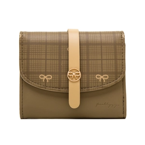 Close-up of checkered pattern PU leather and bow charm on a trifold women's wallet