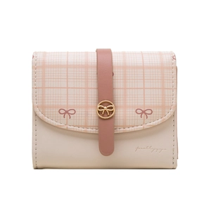 Close-up of pink checkered PU leather wallet with elegant gold bow buckle and logo