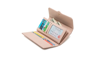 Detail view of pink long wallet interior with multi-functional card slots and compartments