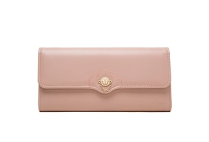 Detail of dusty pink long wallet featuring golden flower buckle and embroidery