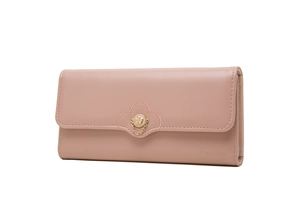 Detail of pink leather wallet featuring a metal flower buckle and cloud-shaped embroidery
