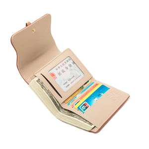 Detailed interior of beige tri-fold wallet showing multiple card slots and large bill compartment