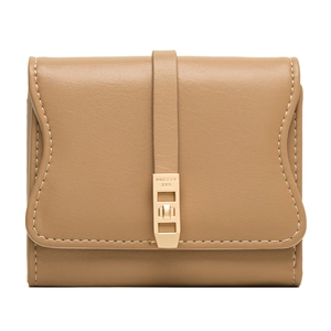 Detail of light brown leather wallet showing white stitching and gold metal clasp