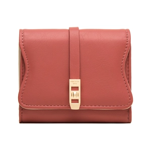 Detailed front view of mauve faux leather wallet with gold metal buckle and texture