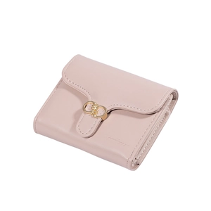 Short tri-fold dusty pink leather wallet for women with golden buckle and sleek stitching