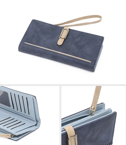 Close-up of matte navy long wallet showing multiple card slots and metal fastener