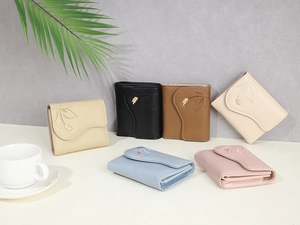 Close-up of elegant tri-fold PU leather wallets with leaf embroidery in multiple colors