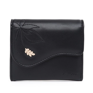 Detail of black tri-fold wallet with leaf embroidery and golden metal charm on PU leather