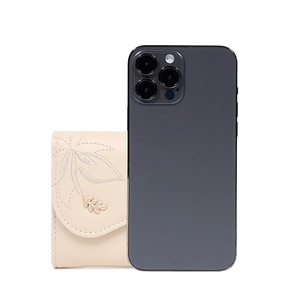 Compact beige tri-fold wallet with leaf embroidery shown next to a smartphone for scale