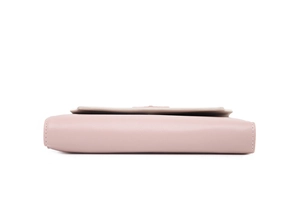 Detail view of pink PU leather wallet showing clean stitching and slim side profile