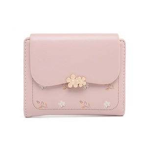 Detail of light pink PU leather short wallet with gold flower clasp and floral prints