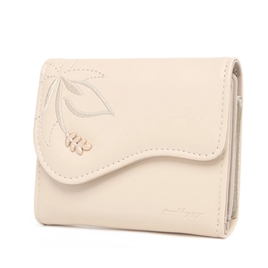 Detail of light beige PU leather wallet with leaf embroidery and golden metal ornament