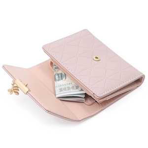 Pink quilted leather tri-fold wallet for women with golden leaf pendant detail