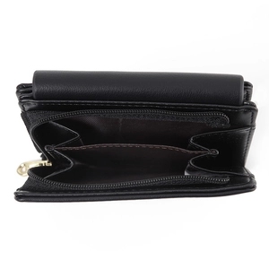 Detail view of black PU leather wallet showing accordion coin pocket and gold zipper