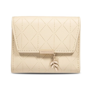 Cream tri-fold wallet for women with quilted stitching and gold leaf charm pendant