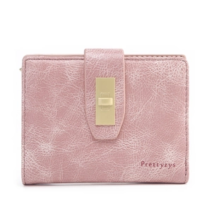 Close-up of pink PU leather wallet with crackle texture and golden buckle fastener