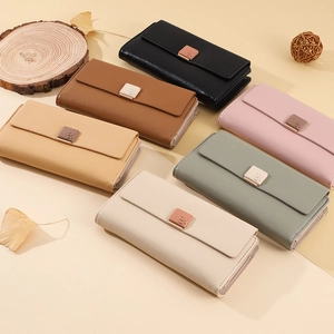 Minimalist long PU leather wallets for women in various colors with leaf embossed buckle