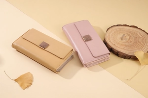 Detail view of large capacity long wallets with leaf metal clasp and accordion structure
