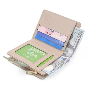 Macro detail of bifold wallet interiors showing multiple card slots and cash compartment