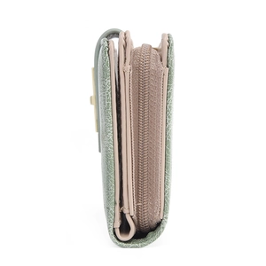Detail view of multi-layer side structure and metal zipper on textured PU leather wallet