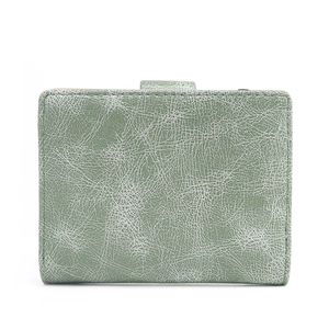 Detail of sage green compact wallet featuring vintage cracked texture and metal buckle