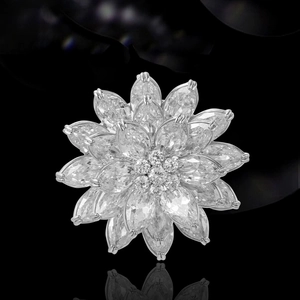 Luxurious snow lotus flower brooch with marquise-cut crystals and silver-tone finish