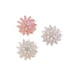 Three-piece floral rotating brooches with pink and white zircon gemstones in gold plating