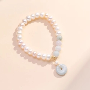 Elegant freshwater pearl bracelet with green jade beads and a safe-buckle pendant