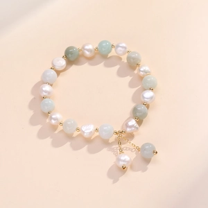 Minimalist fresh water pearl and green jade bead bracelet with gold metal spacers
