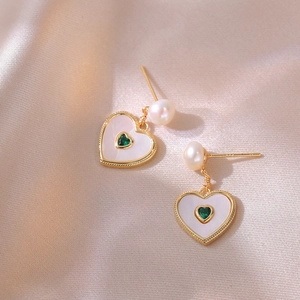 Golden heart drop earrings with green gemstone and pearl on champagne silk