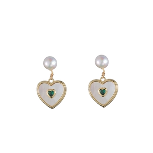 Elegant gold heart earrings with white mother of pearl and green zircon center