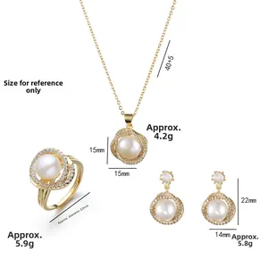 Three-piece pearl jewelry set with gold-plated necklace, earrings and ring in white background