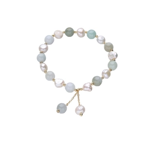 Elegant Tianshan jade and freshwater pearl beaded bracelet with gold accents on white base