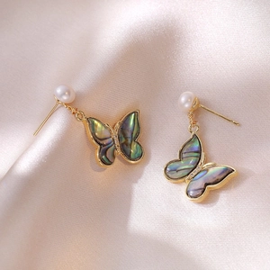 Elegant butterfly drop earrings with freshwater pearls and iridescent abalone shell wings