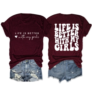 Detail of burgundy T-shirt with 'LIFE IS BETTER WITH MY GIRLS' print and denim shorts
