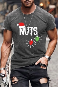 Close-up of gray cotton t-shirt featuring festive NUTS print with a red Santa hat motif