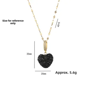 Golden heart necklace featuring a 35mm black zircon pavé pendant and adjustable chain