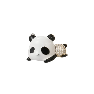 Macro detail of panda brooch with pavé set crystals and enamel finish on white background