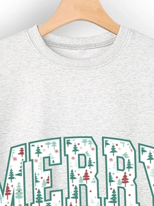 Close-up of ribbed neckline and festive 'MERRY' print on grey Christmas sweatshirt