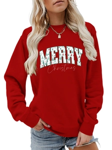 Macro detail of red Merry Christmas sweatshirt with festive graphic print and crew neck