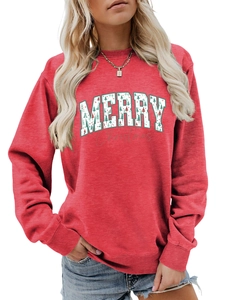 Detail of red Christmas sweatshirt featuring Merry print with tree and dot pattern