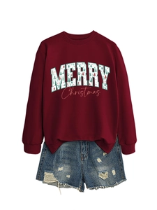 Detail of red Merry Christmas sweatshirt with tree print and distressed denim shorts