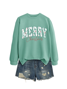 Detail of mint green Merry Christmas sweatshirt and distressed denim shorts set