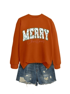 Detail of caramel Christmas sweatshirt featuring festive tree typography and soft cotton knit